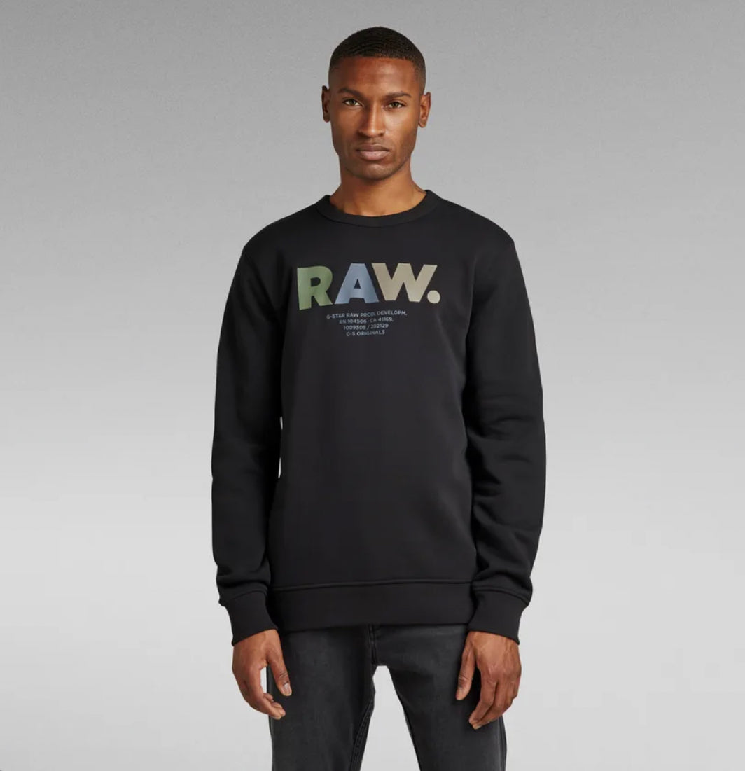 MULTI COLORED RAW. SWEATER